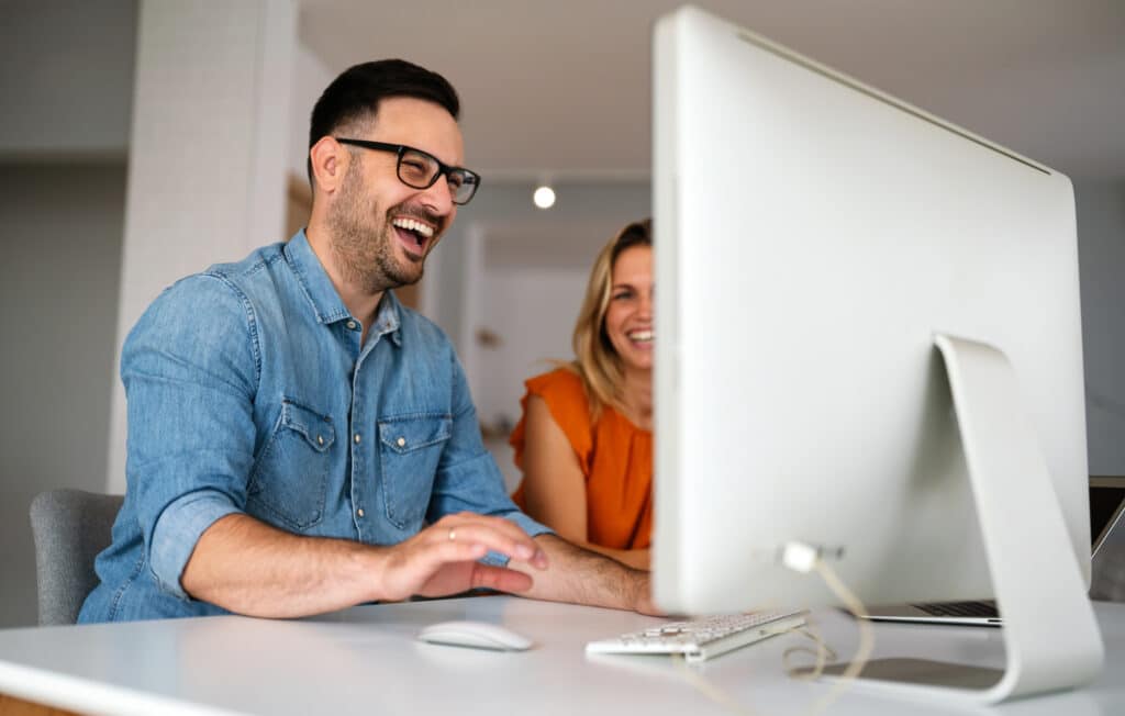 portrait of success business people working together in home office. couple teamwork startup concept