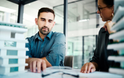 business people, architect and 3d model planning for construction, architecture or building at the office. engineering team in meeting for industrial design, discussion or idea for project plan