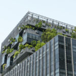 eco friendly building in modern city. sustainable glass office b