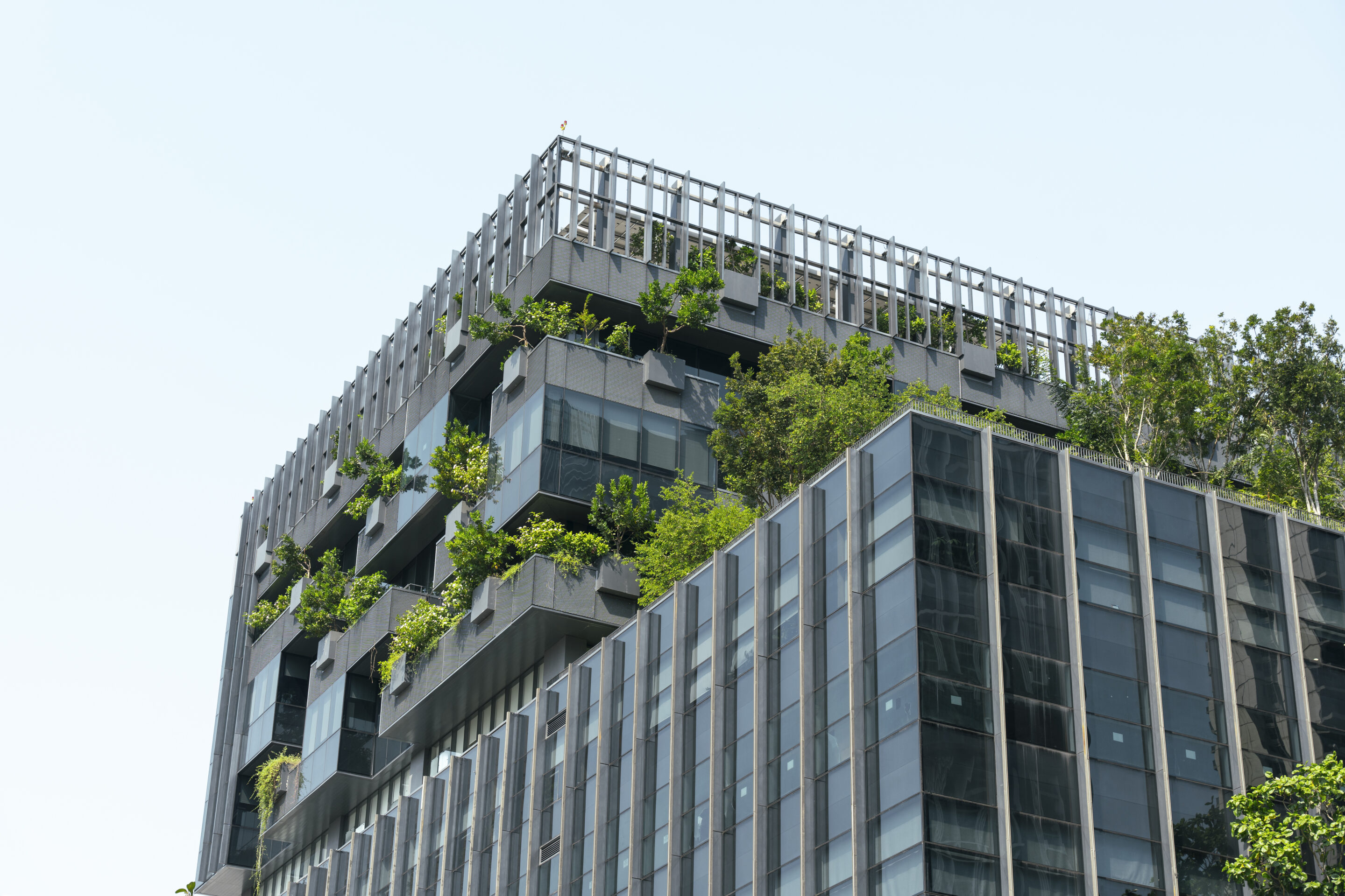eco friendly building in modern city. sustainable glass office b
