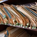 old folders with documents in the library.