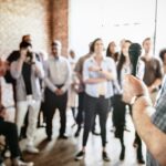 man speaking in a seminar